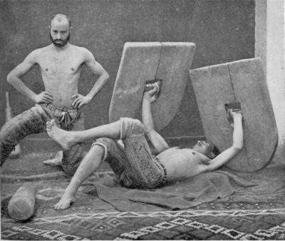 Palawans, or Strong Men giving a Display of Feats of Strength. Palawans, or Strong Men giving a Display of Feats of Strength.
