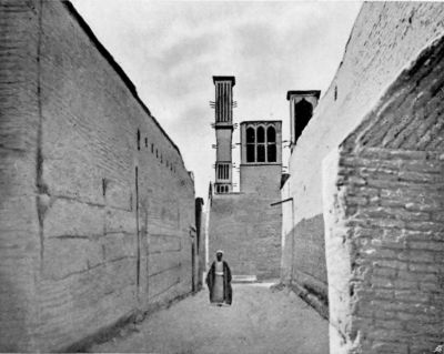 A Street in Yezd, showing High Badjirs or Ventilating Shafts. A Street in Yezd, showing High Badjirs or Ventilating Shafts.