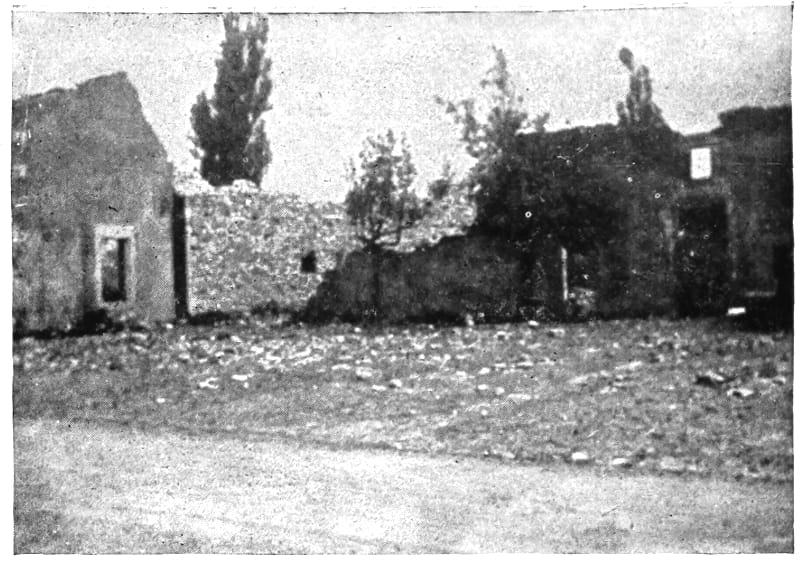 Buildings demonstrating damage.