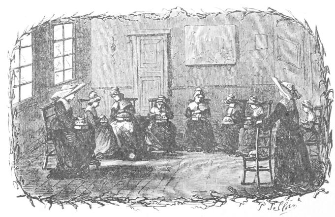 Seven girls woring on pillows with two teachers Seven girls woring on pillows with two teachers