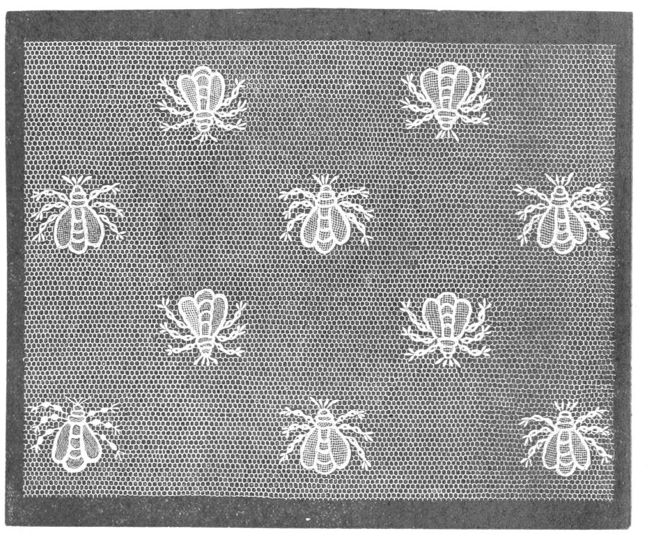 Lace bee motifs on hexagonal net ground Lace bee motifs on hexagonal net ground