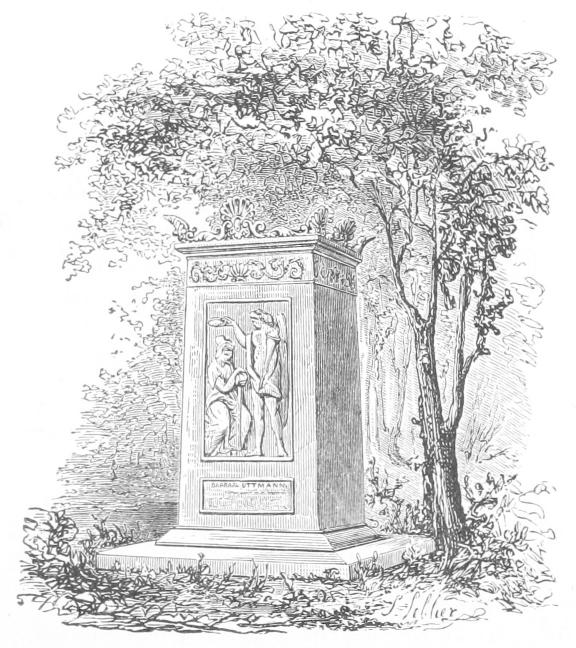 Monument with carved human figures Monument with carved human figures