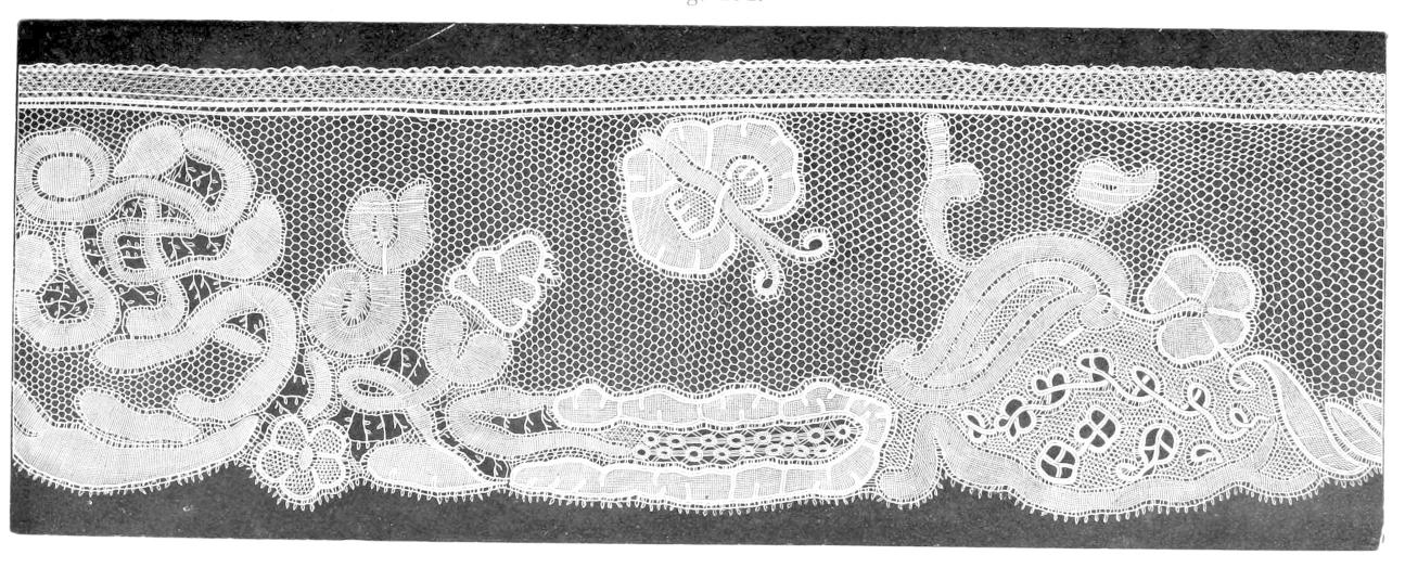 Lace with stylised butterfly and plants Lace with stylised butterfly and plants