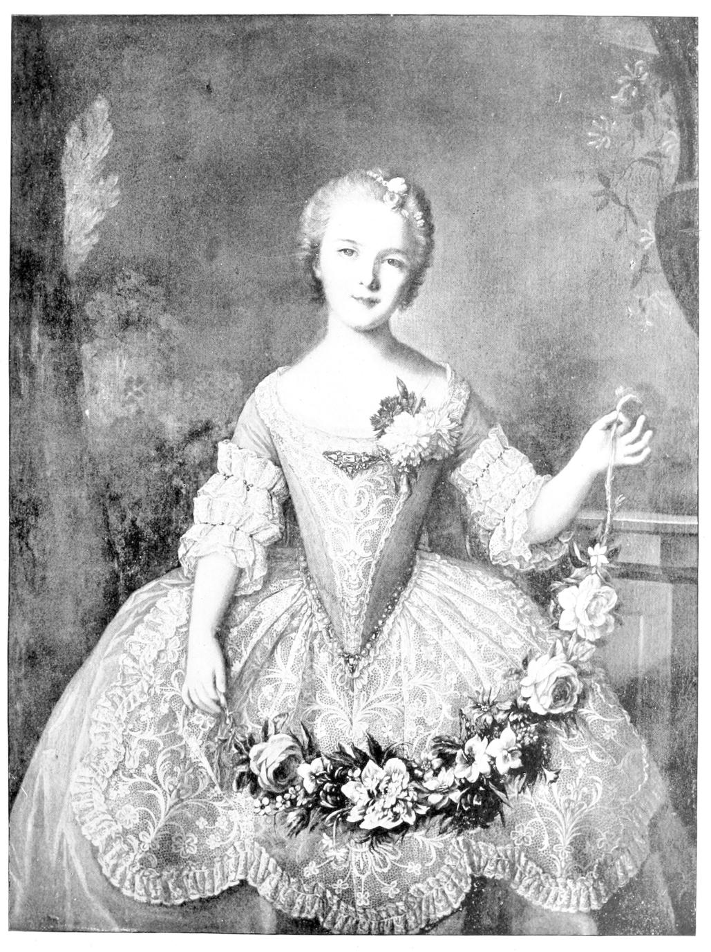 Girl in dress heavily decorated with     lace