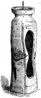 Fig. 213.—Pottery candlestick.