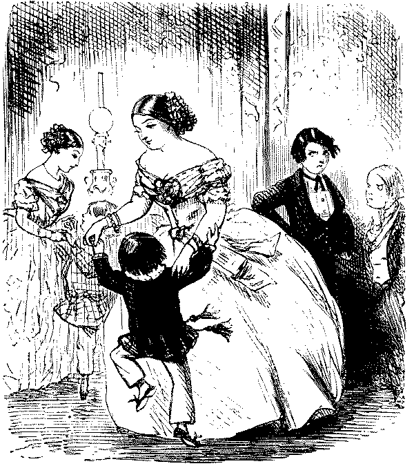 Youths watching lady dancing with small boy.