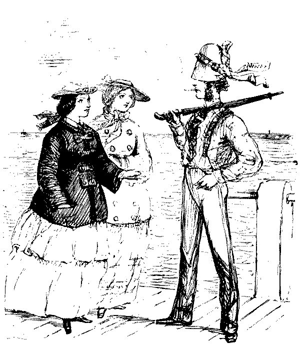 Man talking to two ladies.