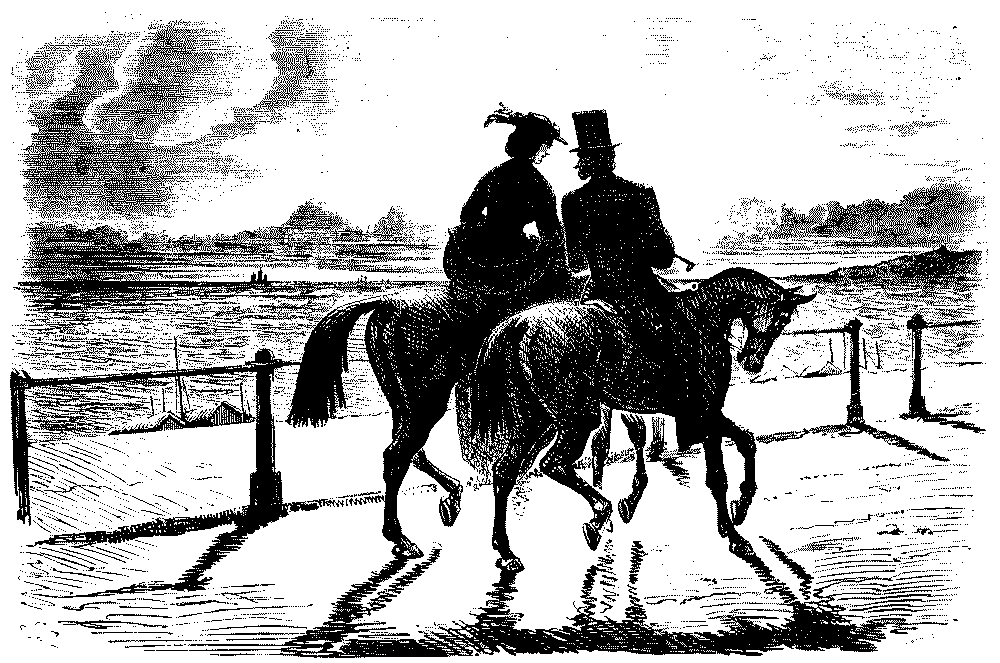 Riding horses along the seafront.