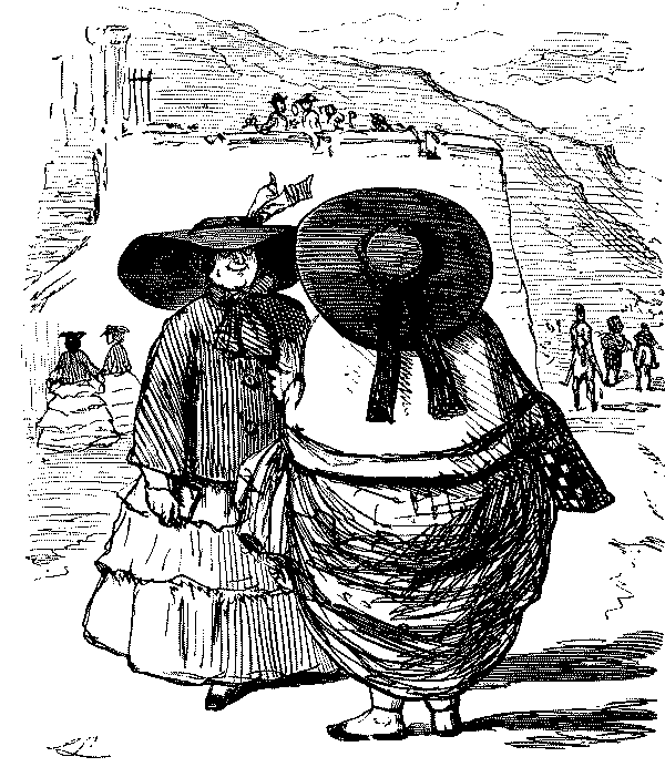 Two ladies discussing their hats.