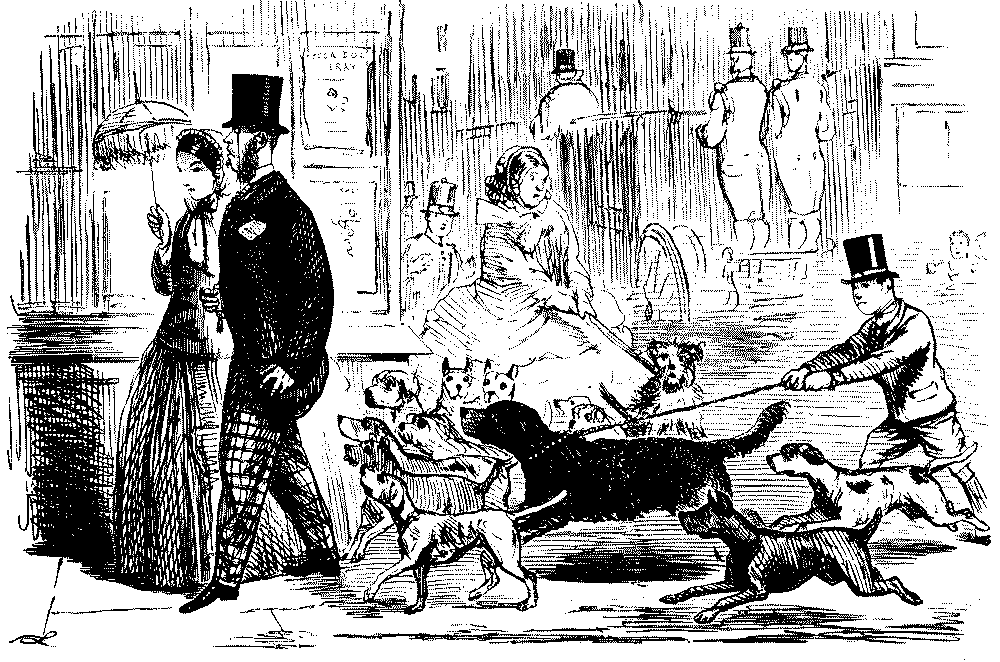 Man followed by pack of dogs.