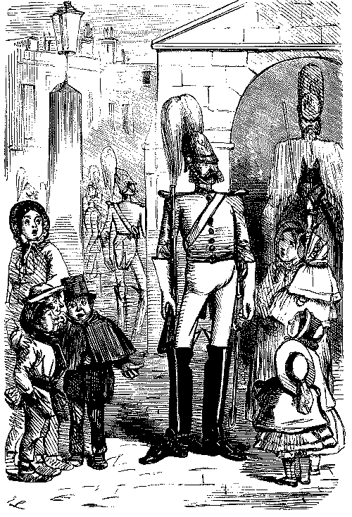 Boy commenting on a soldiers uniform.