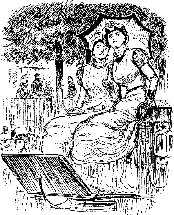 Two women watching cricket.