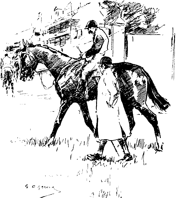 Trainer talking to jockey.