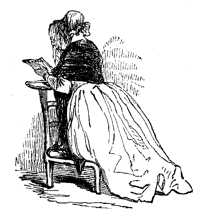 A woman kneels on a prayer stool.