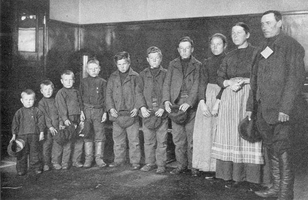 WHERE THE WORKERS COME FROM. Family of German immigrants, passing through Ellis Island on their way to the Middle West. (Courtesy of U.S. Immigration Station, Ellis Island.)