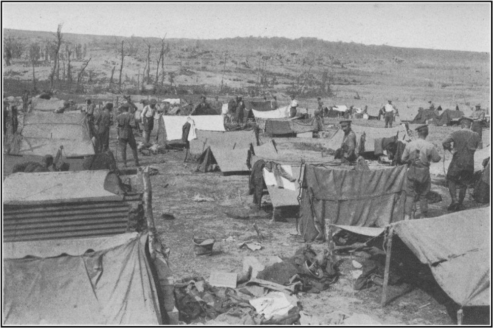 Looking at Fricourt and Fricourt Wood. Troops bivouac for a Short Rest under Ground Sheets laced together