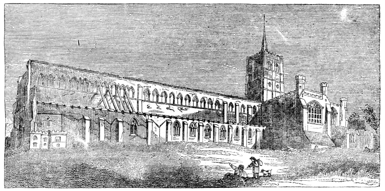 A large, cruciform ecclesiastical building with a steeple at the center.