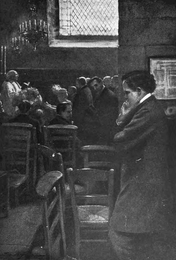 A man is standing in the foreground with a concerned expression with his hand on his face in a thoughtful pose. In the background, a group of people is gathered, attending an event led by a priest who is visible near the altar.
