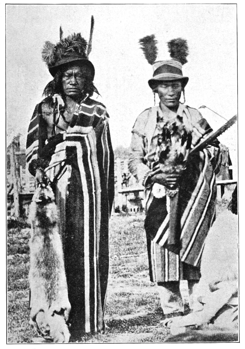 Two native men standing