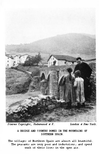 A bridge and country homes in the mountains of Northern Spain