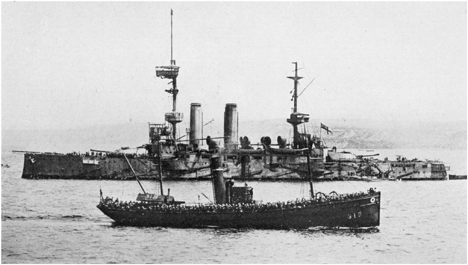 Landing British troops from the transports at the Dardanelles under the protection of the battleships