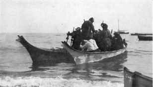 WATERMAN—CANOES PL. III TWO SUQUAMISH “WAR CANOES” LASHED TOGETHER AND CARRYING A PLATFORM OF POLES This device was used in transporting house-planks and for moving large quantities of effects from one site to another. (Photographed at Suquamish, Washington, 1913.)