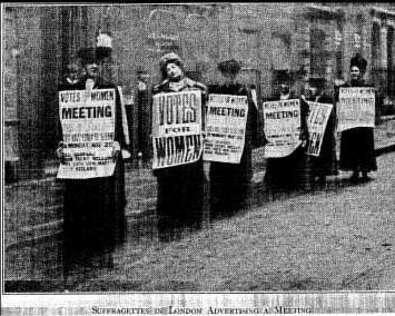 SUFFRAGETTES IN LONDON ADVERTISING A MEETING SUFFRAGETTES IN LONDON ADVERTISING A MEETING