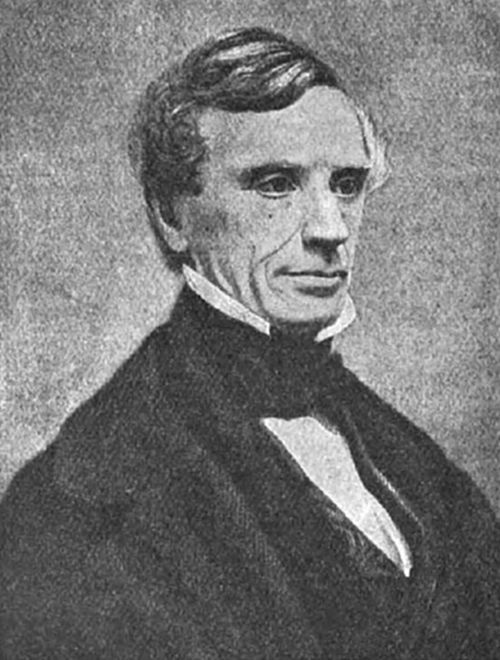 A lean, sharp-featured middle-aged man in 19th-century dress with a dark coat and bow tie — consistent with portraits of Samuel Morse, inventor of the Morse Code telegraph.